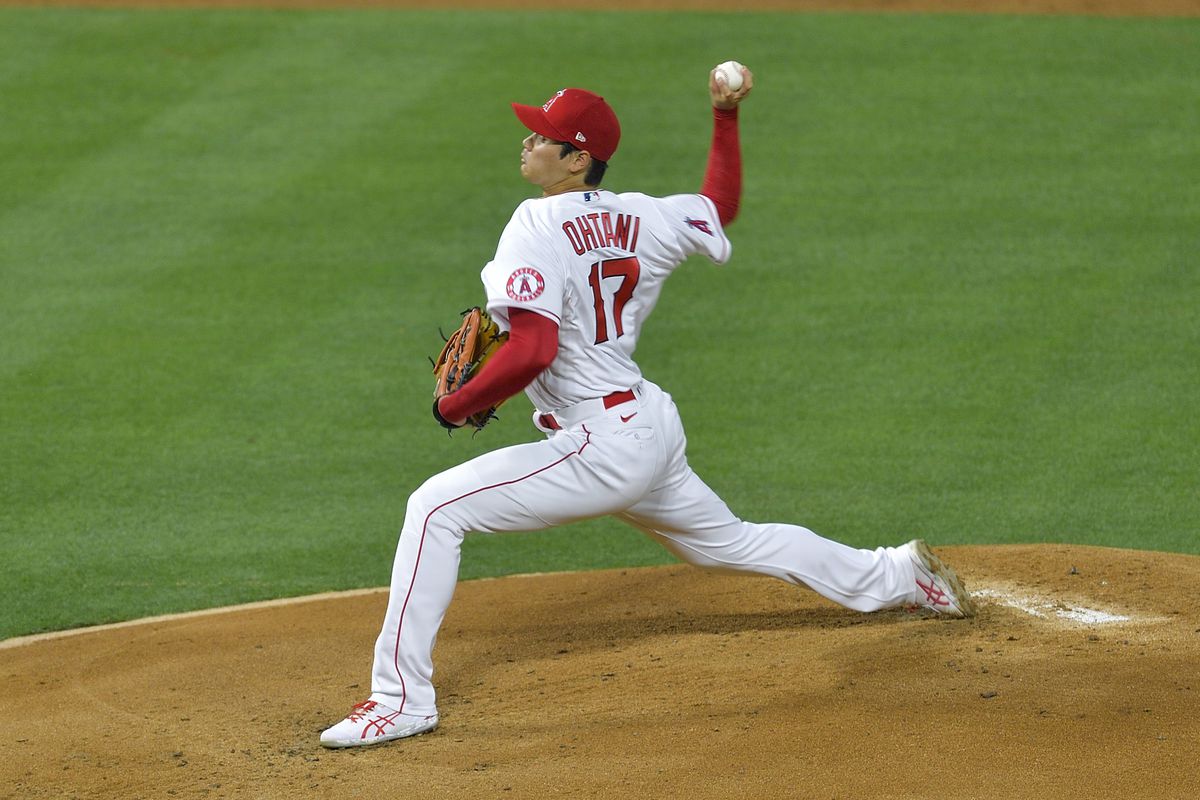 Shohei Ohtani delivers a pitch against the Astros during opening day at Angel Stadium in Anaheim, CA, on Thursday, April 7, 2022.