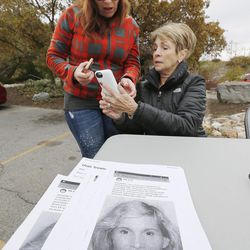 Joy Gonzalez and Carol Thorn help organize the search for Nicole Harris in Rock Canyon in Provo Oct. 28, 2015. Gonzalez is Harris' sister. 