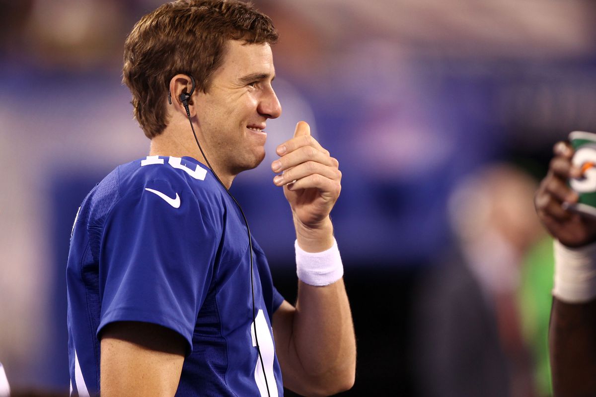 Eli Manning reportedly has $84 million new reasons to smile.