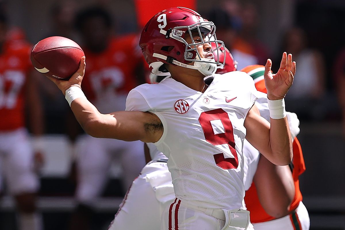 Bryce Young of the Alabama Crimson Tide looks to pass against the Miami Hurricanes during the first half of the Chick-fil-A Kick-Off Game at Mercedes-Benz Stadium on September 04, 2021 in Atlanta, Georgia.