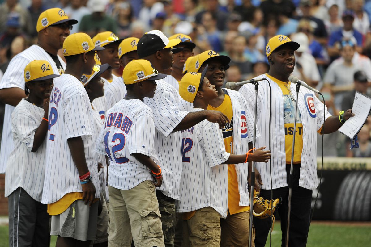 The kids from Jackie Robinson West lead the seventh-inning stretch.