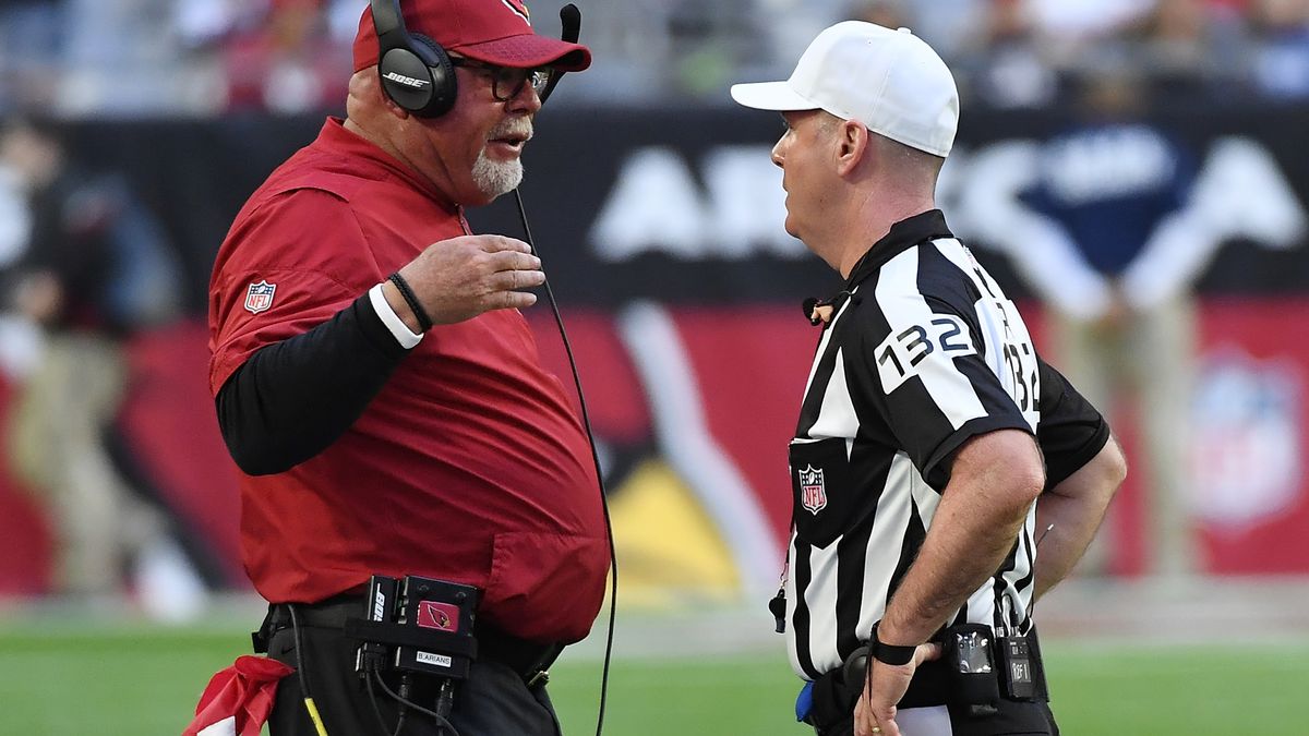 Head coach Bruce Arians of the Arizona Cardinals talks with referee John Parry #132 during a game against the New York Giants at University of Phoenix Stadium on December 24, 2017 in Glendale, Arizona.
