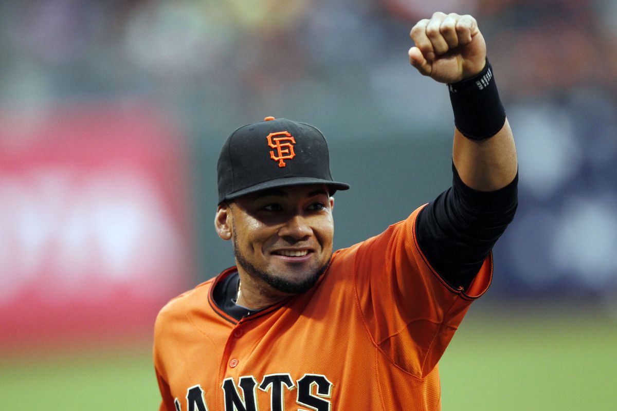 This is a photograph of Melky Astacio Cabrera, who plays left field for the San Francisco Giants.