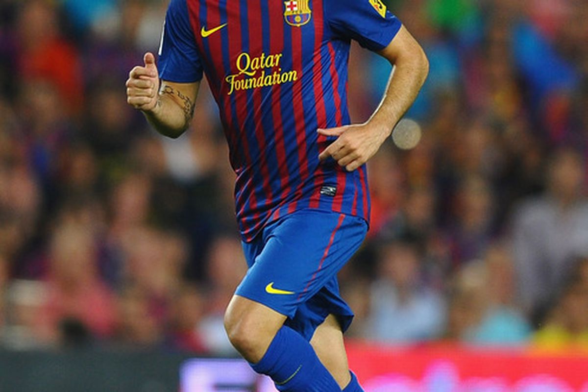 BARCELONA, SPAIN - AUGUST 17: Cesc Fabregas of Barcelona in action during the Super Cup second leg match between Barcelona and Real Madrid at Nou Camp on August 17, 2011 in Barcelona, Spain.  (Photo by Laurence Griffiths/Getty Images)