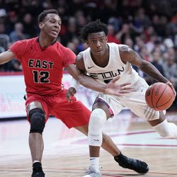 Rockford East’s Sha’Den Clanton (12) tries to knock the ball away from Evanston’s Lance Jones (5), Friday 03-15-19. Worsom Robinson/For the Sun-Times