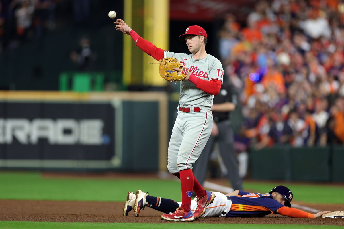 Rhys Hoskins #17 of the Philadelphia Phillies reacts to Jose Altuve #27 of the Houston Astros being safe during the sixth inning in Game Six of the 2022 World Series at Minute Maid Park on November 05, 2022 in Houston, Texas.