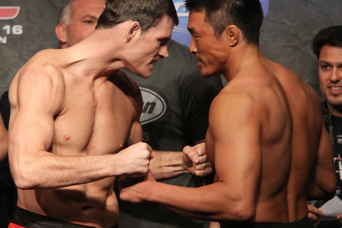 LONDON - OCTOBER 15:  (L-R) Middleweight opponents Michael Bisping and Yoshihiro Akiyama face off at the UFC 120 weigh-in at Earl's Court Arena on October 15 2010 in London England.  (Photo by Josh Hedges/Zuffa LLC/Zuffa LLC via Getty Images)