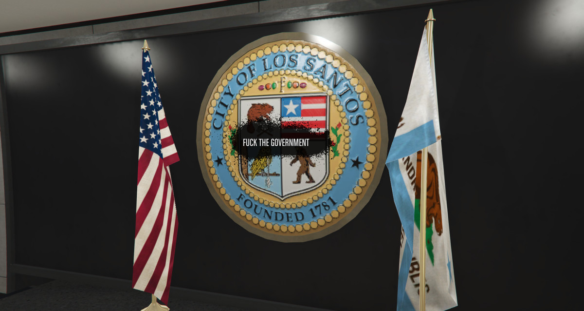 GTA Online - a player has left the message “FUCK THE GOVERNMENT” over the sigil of City Hall