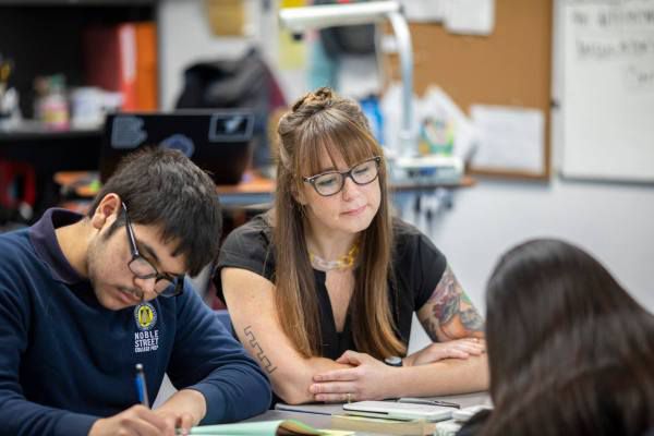 Teacher Kelly Knierim works with students at Noble Street College Prep. | Provided by Noble Network of Charter Schools