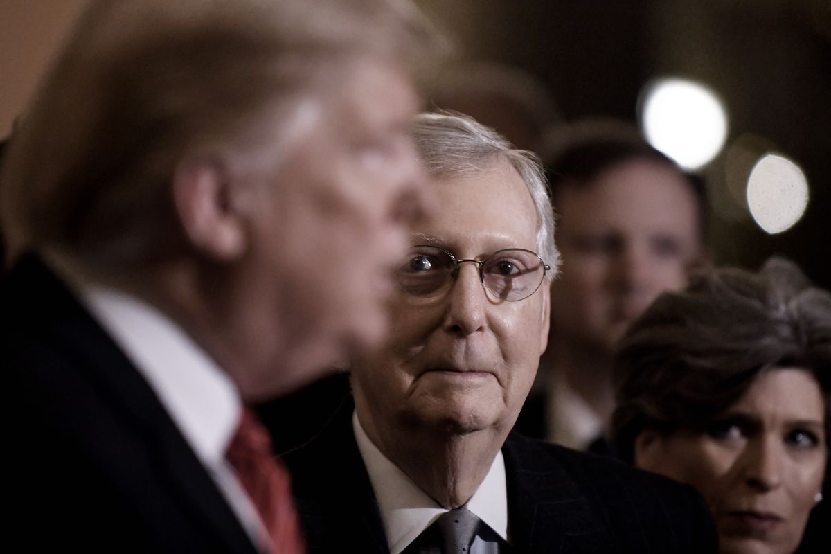 President Donald Trump and Senate Majority Leader Mitch McConnell (R-KY) looks on January 9, 2019.