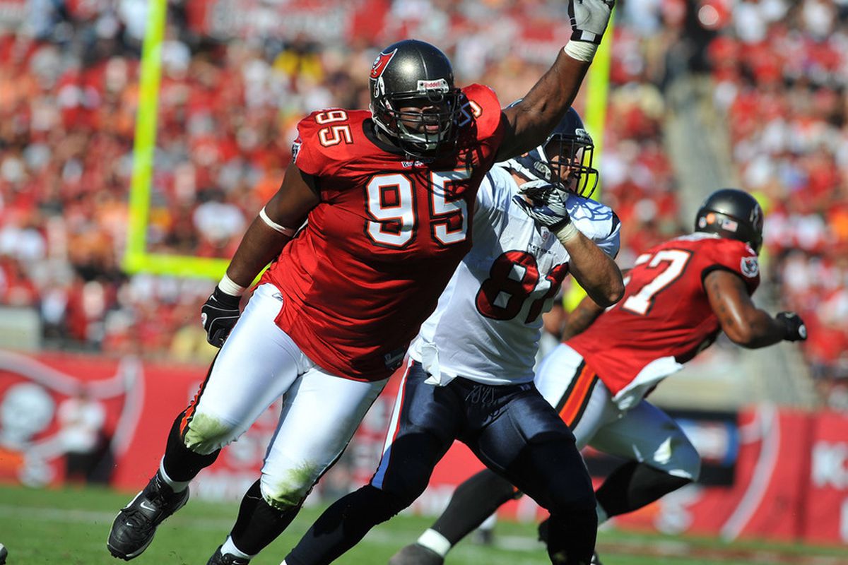 TAMPA, FL - NOVEMBER 13:  Defensive tackle Albert Haynesworth #95 of the Tampa Bay Buccaneers rushes the pocket against the Houston Texans November 13, 2011 at Raymond James Stadium in Tampa, Florida. (Photo by Al Messerschmidt/Getty Images)