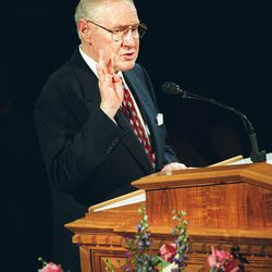 President Faust of the First Presidency and giving a talk at the Annual Relief Society Meeting at the LDS Tabernacle in 1999.