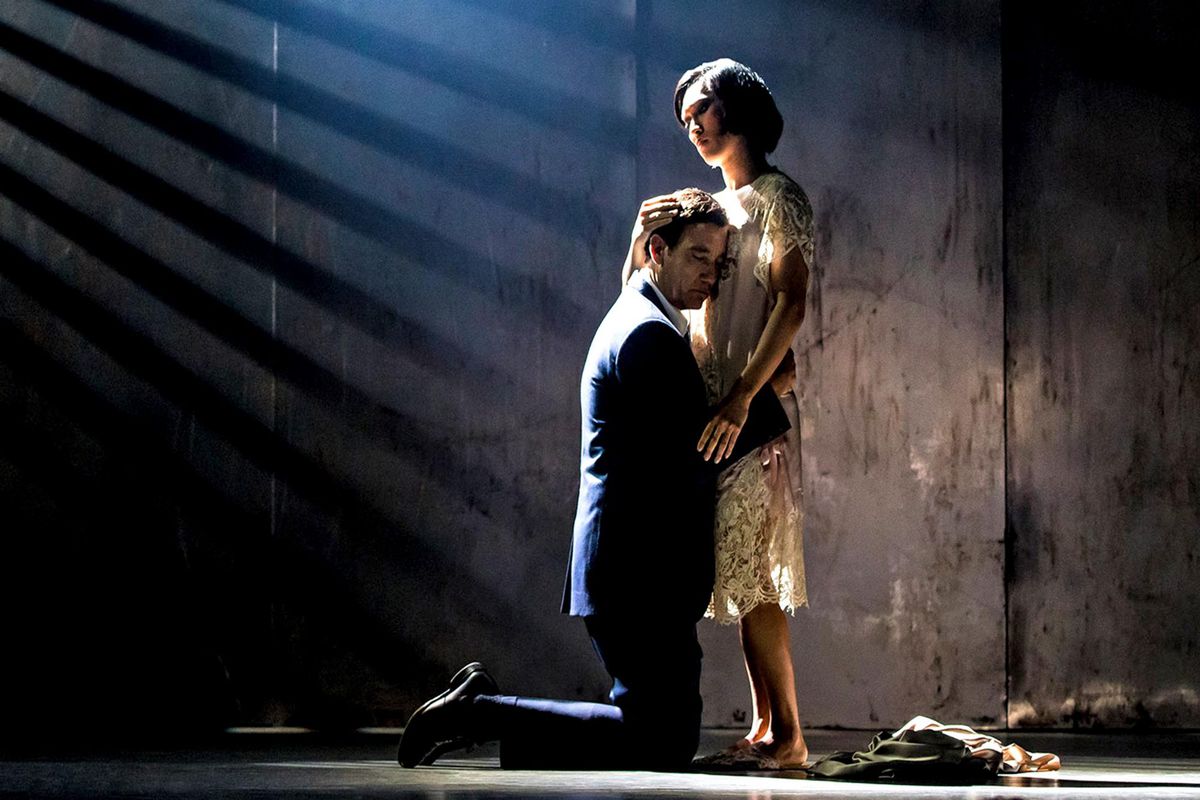 Rene (Clive Owen) hugs Song (Jin Ha) in a still from the Broadway revival of M. Butterfly