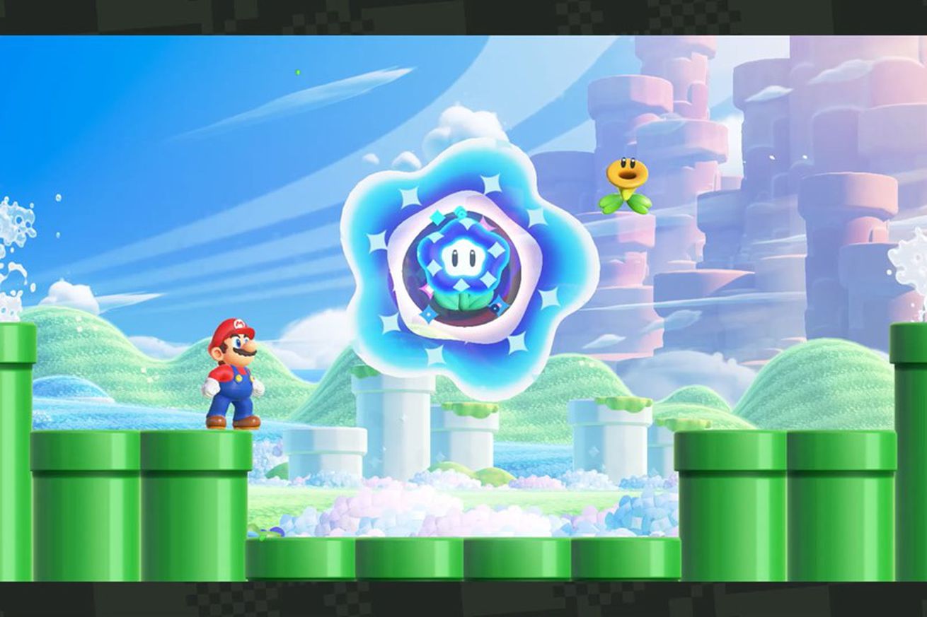 A screenshot from the Nintendo Switch game Super Mario Bros. Wonder, with Mario staring up at a glowing flower.