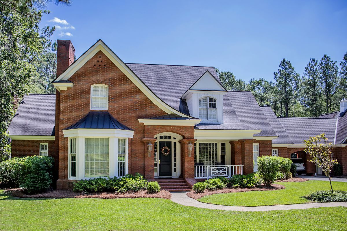 Red brick traditional southern home.