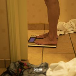 Ilima-Lei Macfarlane checks the weight on her own scale