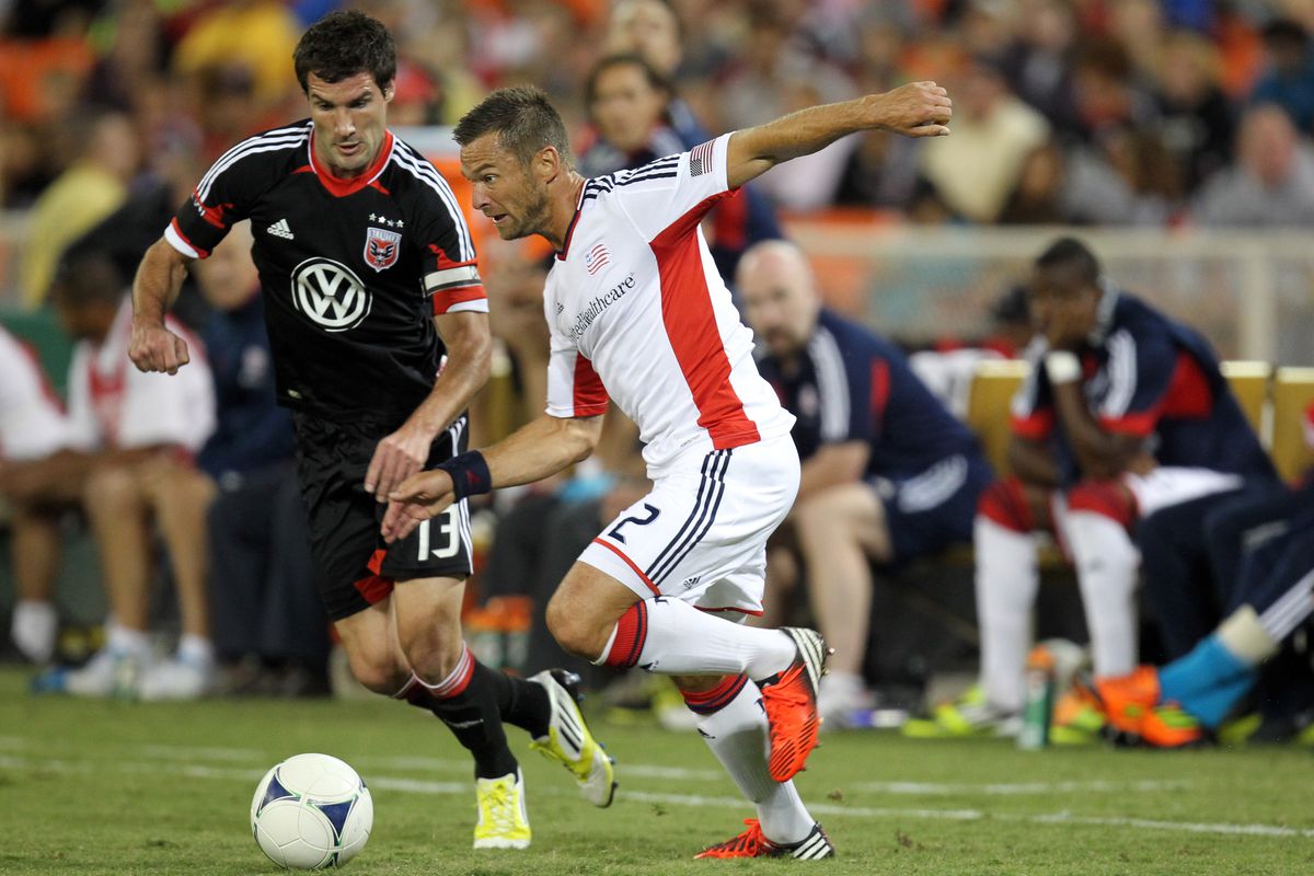 WASHINGTON, DC - SEPTEMBER 15: Florian Lechner #2 of the New England Revolution controls the ball against Chris Pontius #13 of D.C. United at RFK Stadium on September 15, 2012 in Washington, DC.(Photo by Ned Dishman/Getty Images)