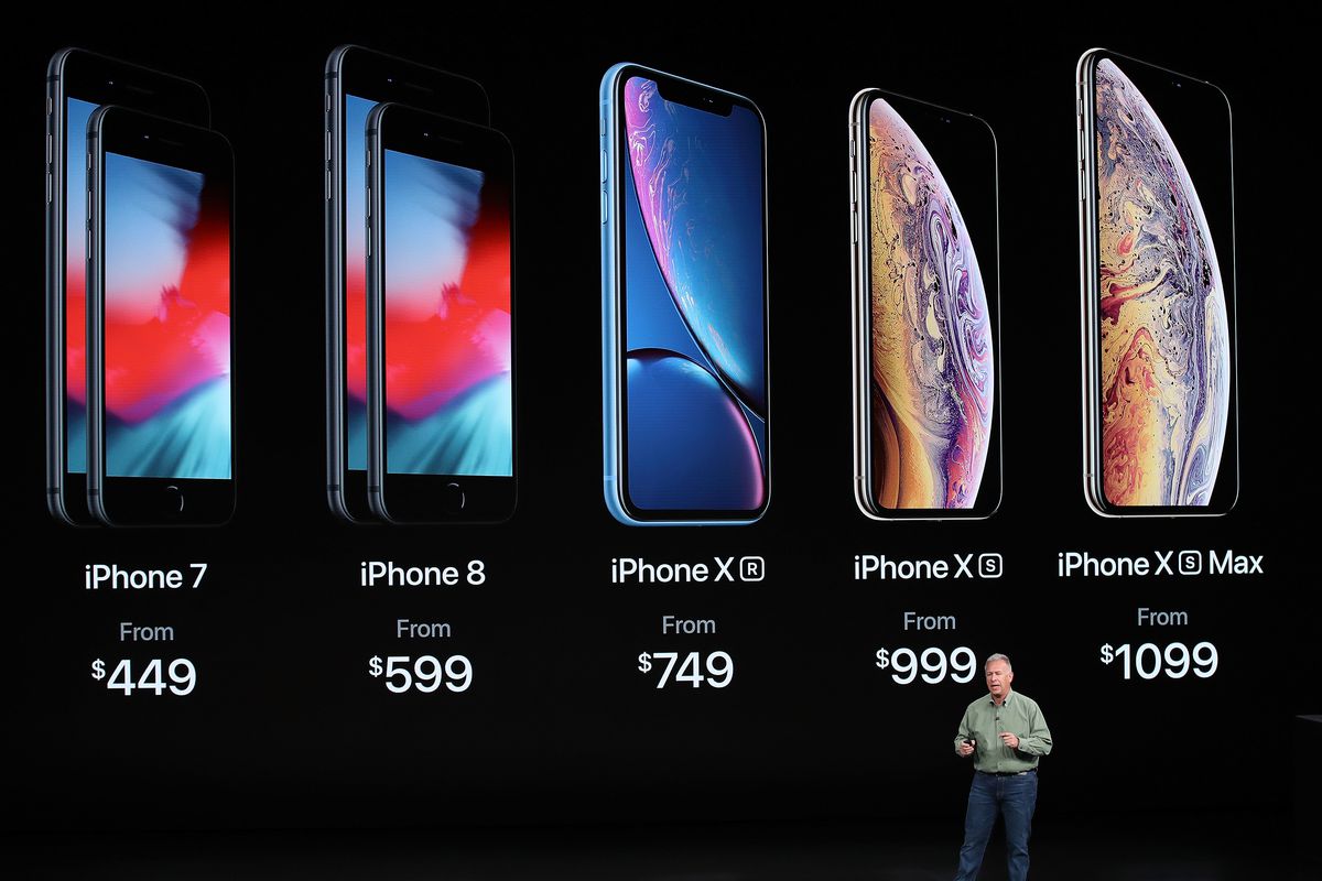 Phil Schiller, senior vice president of worldwide marketing at Apple, discusses the company’s new iPhones at an event in Cupertino, California in September 2018.
