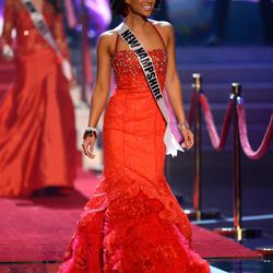 Miss New Hampshire Amber Faucher walks onstage during the Miss USA 2013 pageant, Sunday, June 16, 2013, in Las Vegas. (AP Photo/Jeff Bottari)