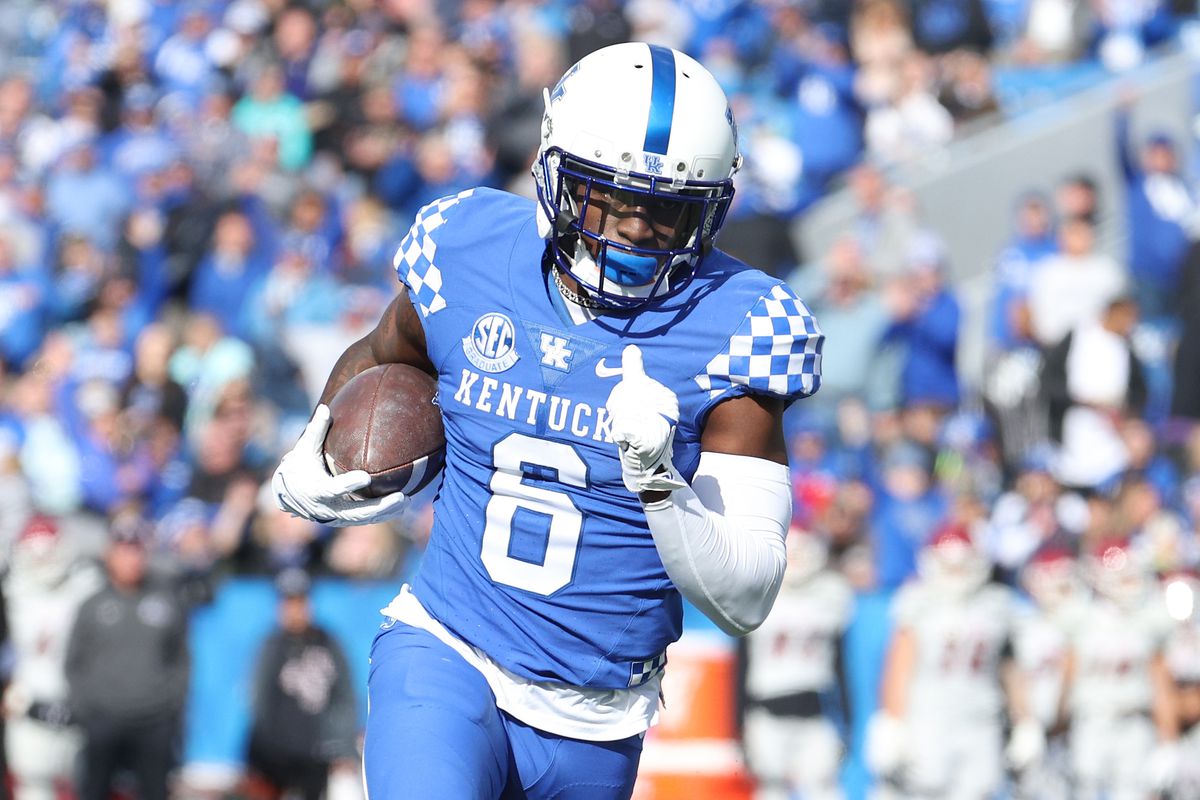 Josh Ali #6 of the Kentucky Wildcats scores a touchdown against the New Mexico State Aggies at Kroger Field on November 20, 2021 in Lexington, Kentucky.