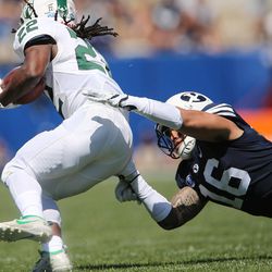 Brigham Young Cougars defensive lineman Sione Takitaki (16) make a tackle on Portland State Vikings running back Za'Quan Summers (22)  in Provo on Saturday, Aug. 26, 2017. BYU won 20-6.