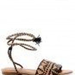 <a href="http://rebeccaminkoff.com/shop/shoes-1/baha-sandals.html"> Rebecca Minkoff Baha sandal</a>, $165 rebeccaminkoff.com