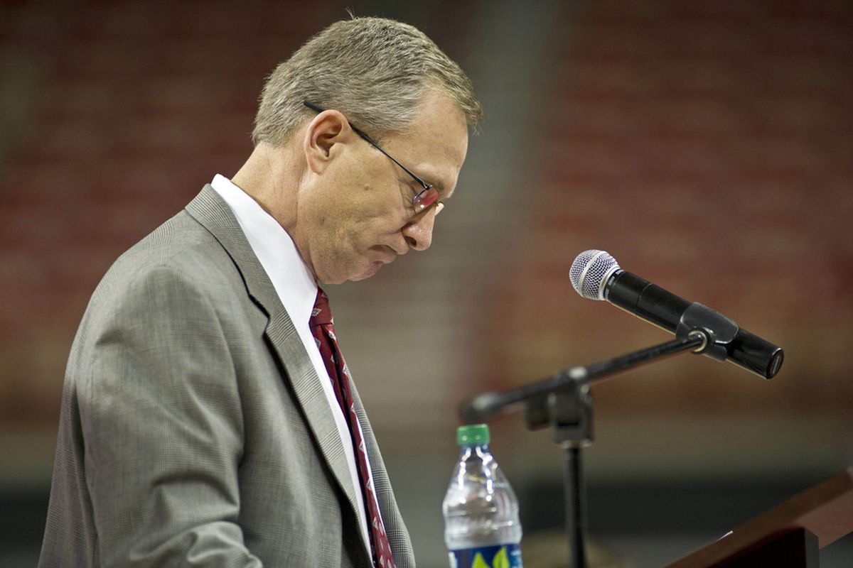April 10, 2012, AR, USA; Arkansas Razorback athletic director Jeff Long pauses during a press conference at Bud Walton Arena to announce the firing of head football coach Bobby Petrino.  Mandatory Credit: Beth Hall-US PRESSWIRE