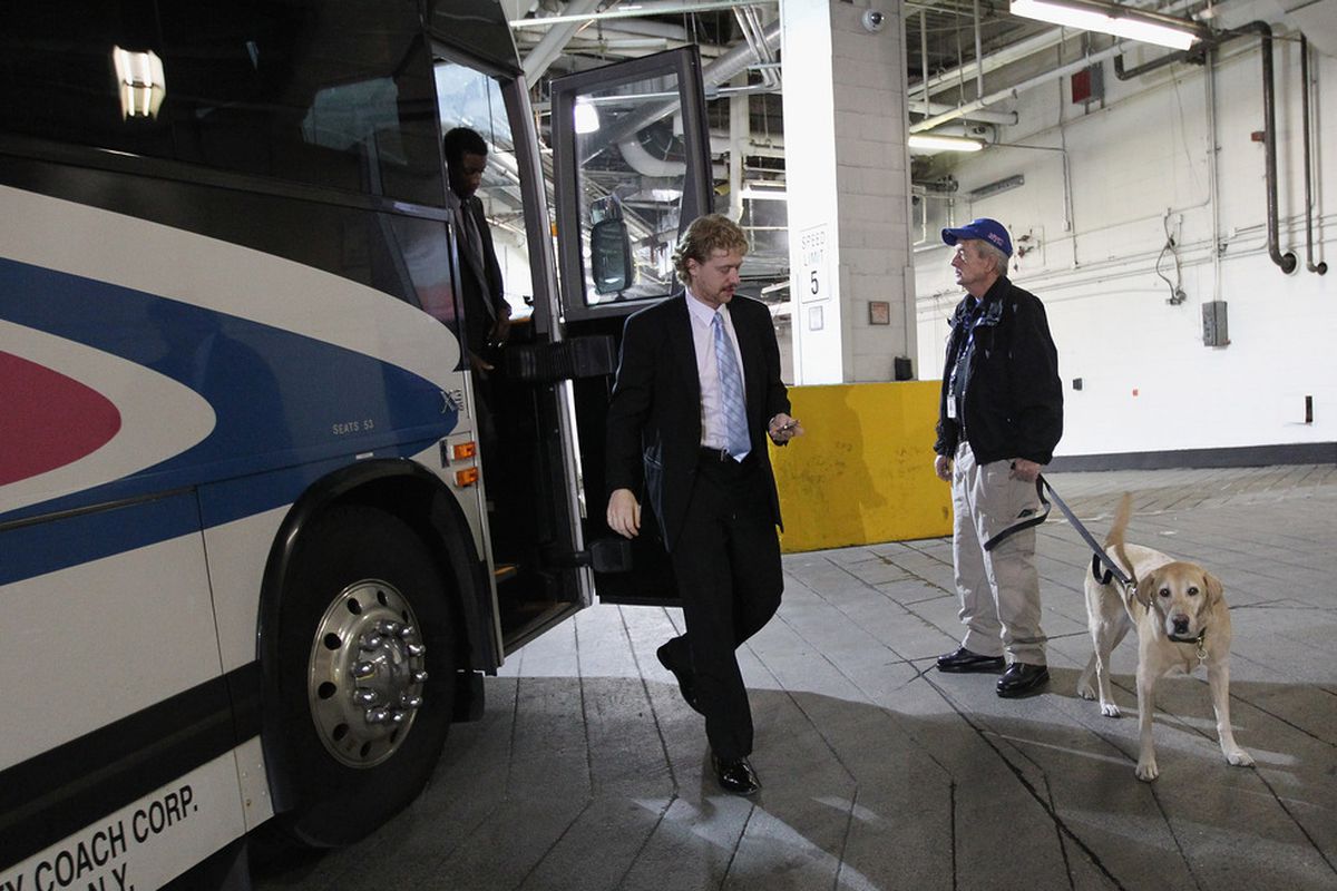 Jake Voracek and his mustache step off a bus. 
