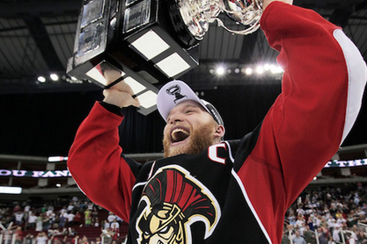 BSens' Captain Ryan Keller celebrates with the Calder Cup in Houston, Texas