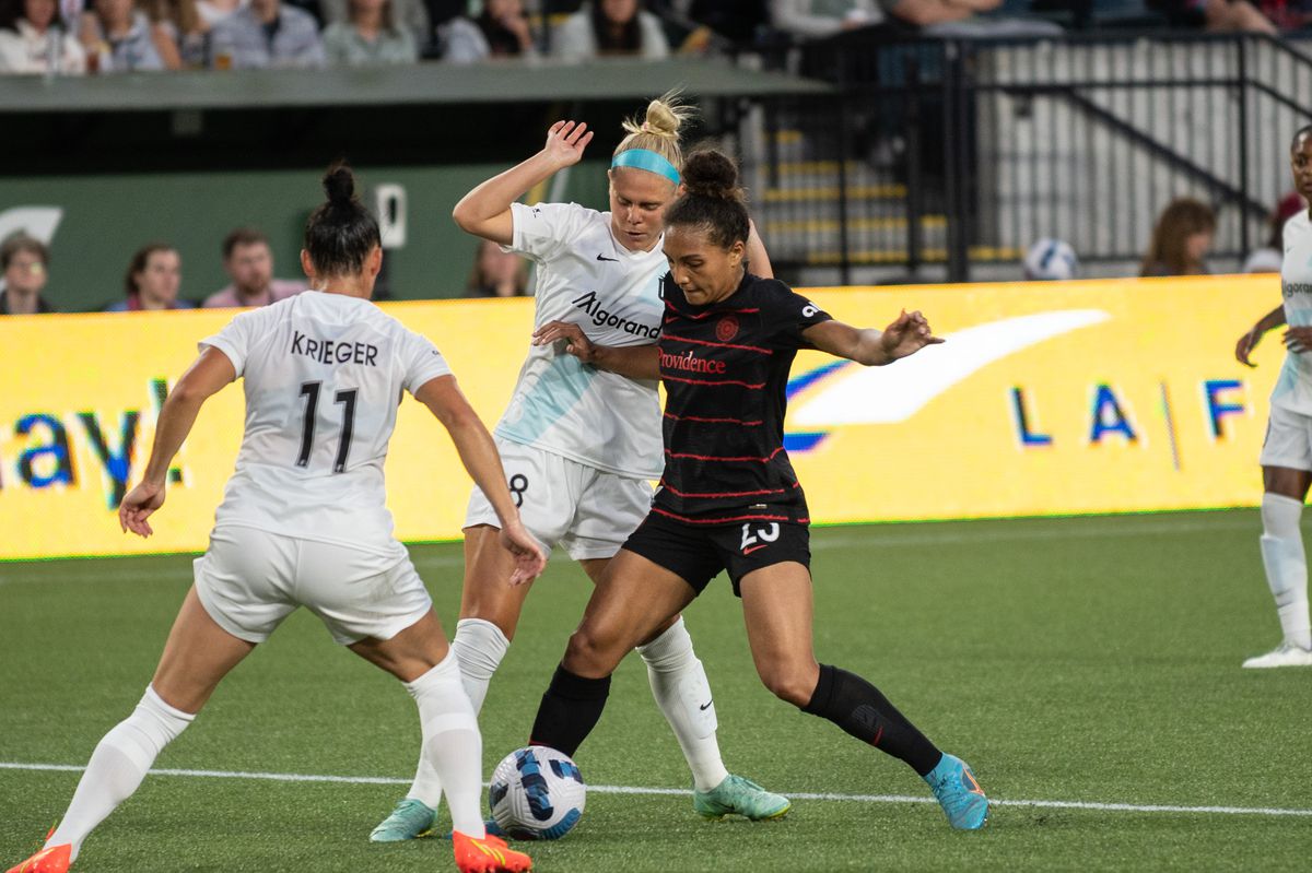 Yazmeen Ryan takes on Cam Tucker and Ali Krieger in her home kit