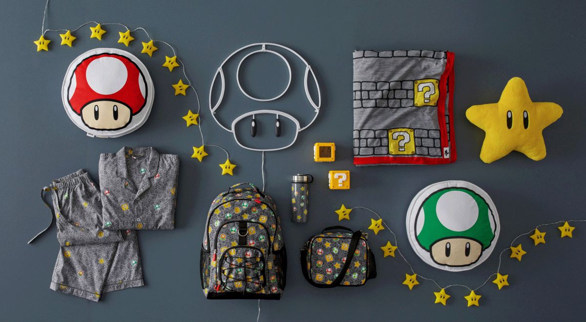 A photo of the entire collection of Pottery Barn Teen’s collaboration with the Super Mario Bros. franchise. The collection is filled with items themed after iconography from the games, including Mushroom power ups, Question Mark boxes, and Super Stars.