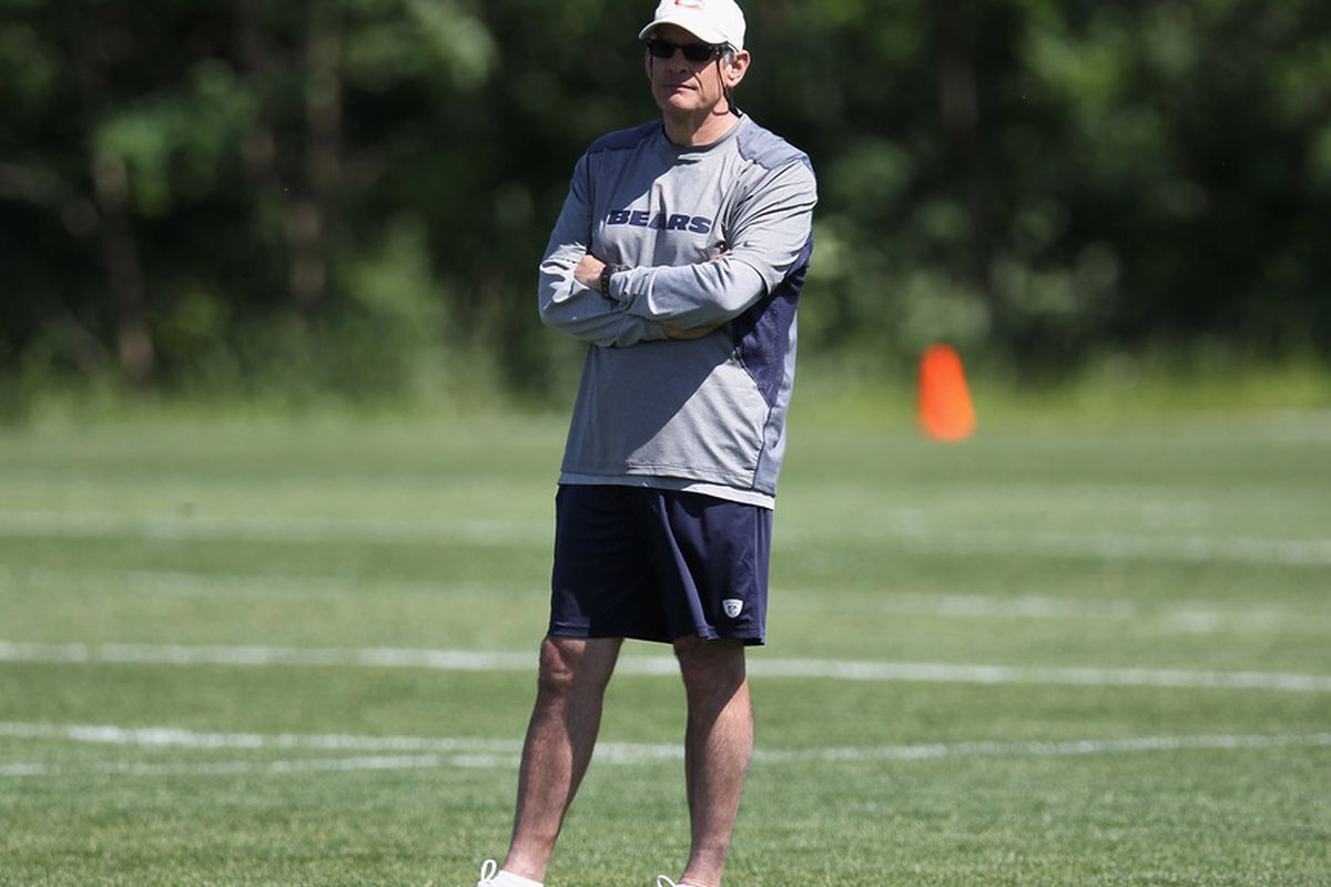 LAKE FOREST, IL - JUNE 12: General manager Phil Emery of the Chicago Bears watches a minicamp practice at Halas Hall on June 12, 2012 in Lake Forest, Illinois. (Photo by Jonathan Daniel/Getty Images)