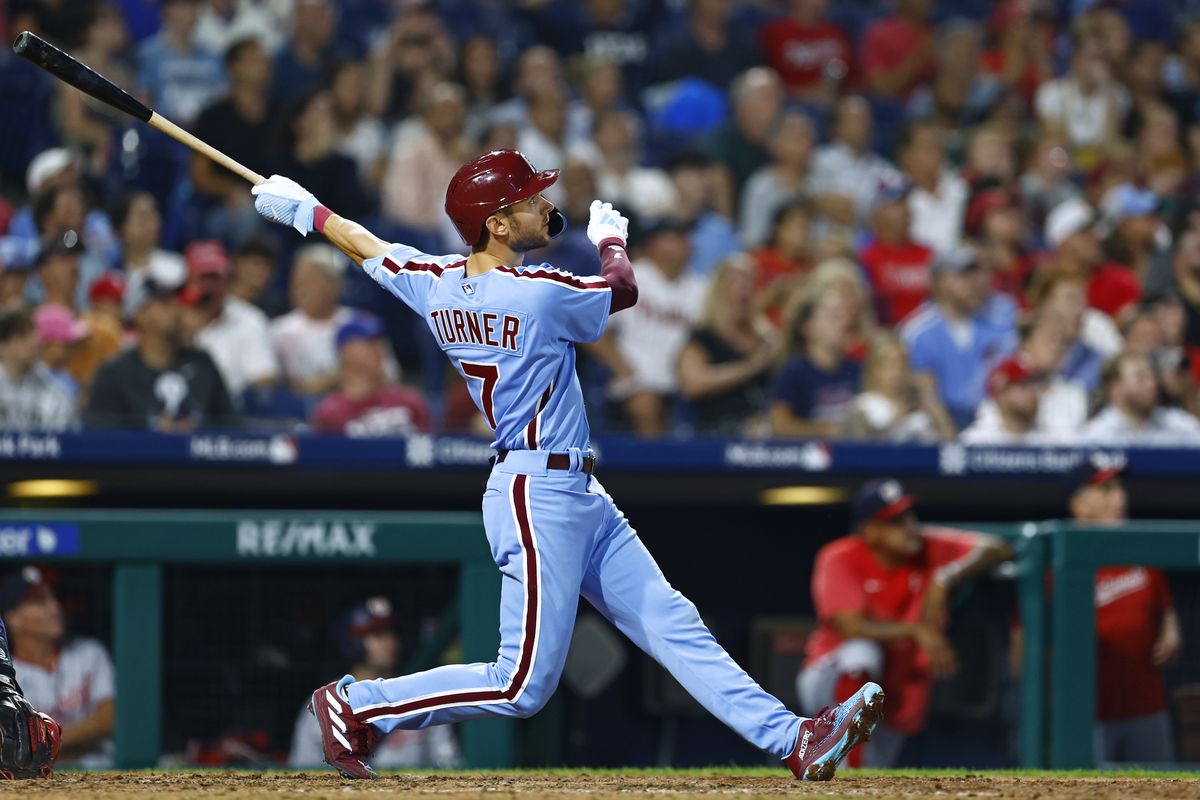 Trea Turner of the Philadelphia Phillies hits a two-run homer against the Washington Nationals during the sixth inning of a game at Citizens Bank Park on August 10, 2023 in Philadelphia, Pennsylvania.