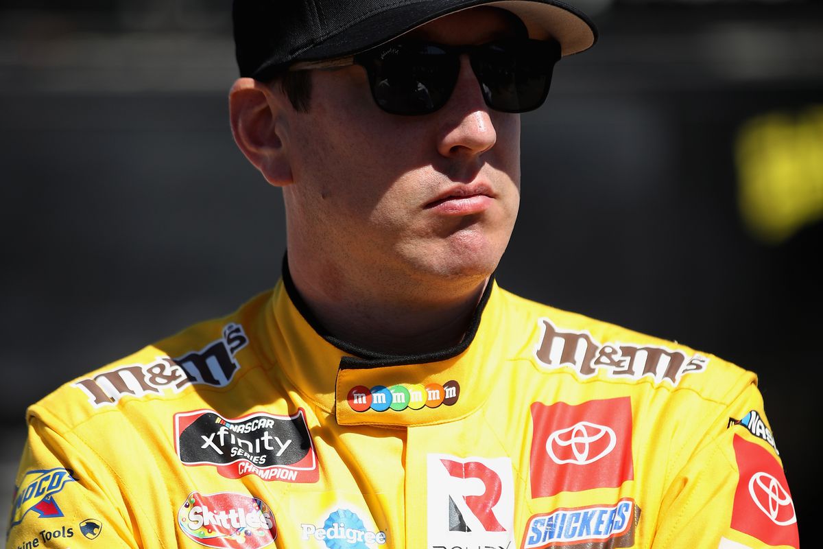 Kyle Busch, driver of the #18 Sport Clips Toyota, stands on the grid during qualifying for the NASCAR Cup Series FanShield 500 at Phoenix Raceway on March 07, 2020 in Avondale, Arizona.