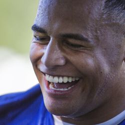 BYU Linebacker Butch Pau'u laughs with teammates after a scrimmage at the BYU Cougars' first practice of the season in Provo on Thursday, July 27, 2017.