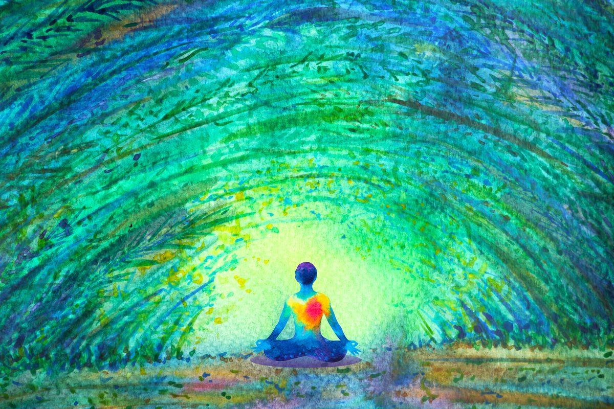 A colorful abstract illustration of a figure sitting down surrounded by bright green and blue light.