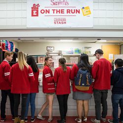 East High School students take some food from the expanded Leopard Stash food pantry in Salt Lake City on Tuesday, Nov. 20, 2018.