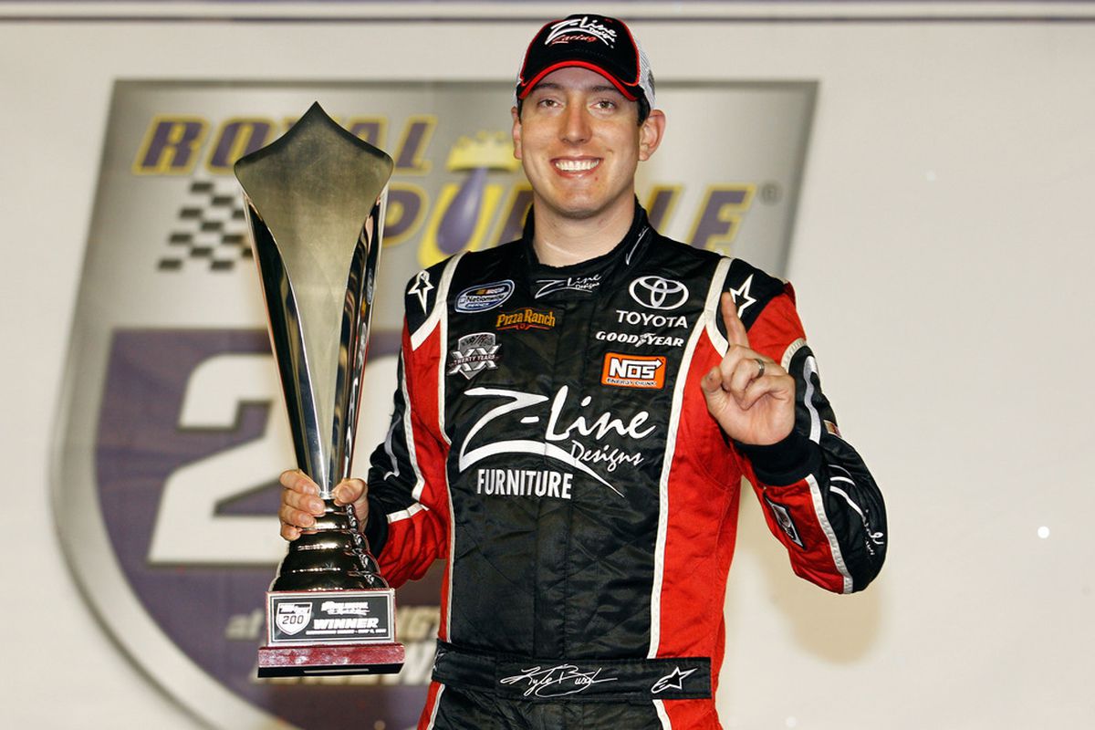 Kyle Busch celebrates in victory lane after winning the NASCAR Nationwide Series Royal Purple 200 at Darlington Raceway.