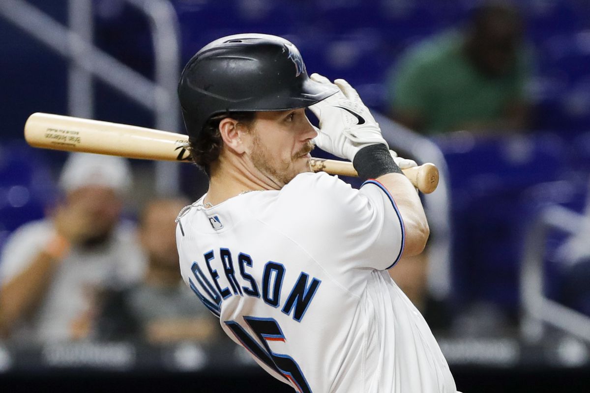 Miami Marlins designated hitter Brian Anderson (15) hits a single during the fourth inning against the Tampa Bay Rays at loanDepot Park.