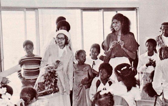 Rosa Parks, left, visits a classroom at the Oakland Community School. School director Ericka Huggins is at right. (Collection of Ericka Huggins, via IPHP)