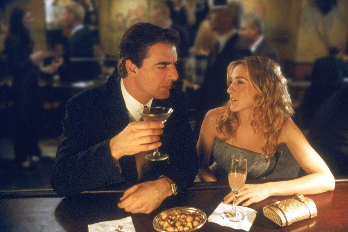 Mr. Big (Chris Noth) and Carrie (Sarah Jessica Parker) share a quiet moment in this scene from the HBO series “Sex and the City.”