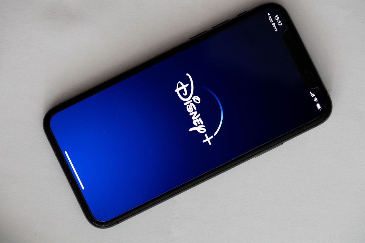 a cellphone screen displaying the Disney+ logo.