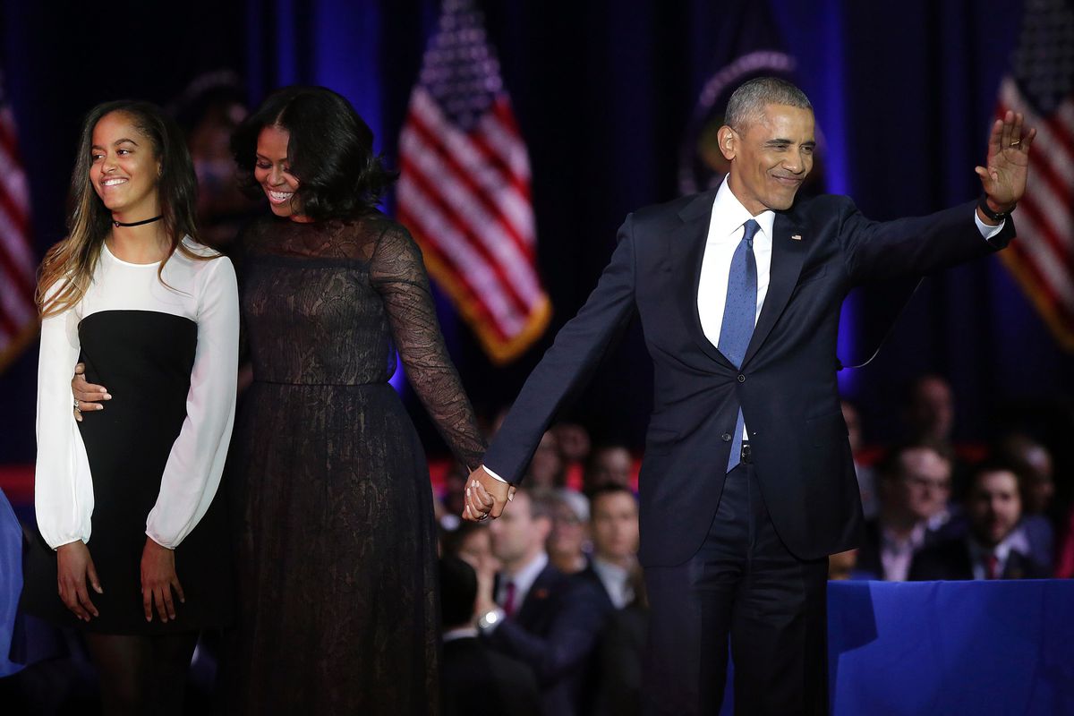 Malia Obama with her parents on stage, after President Obama’s farewell address