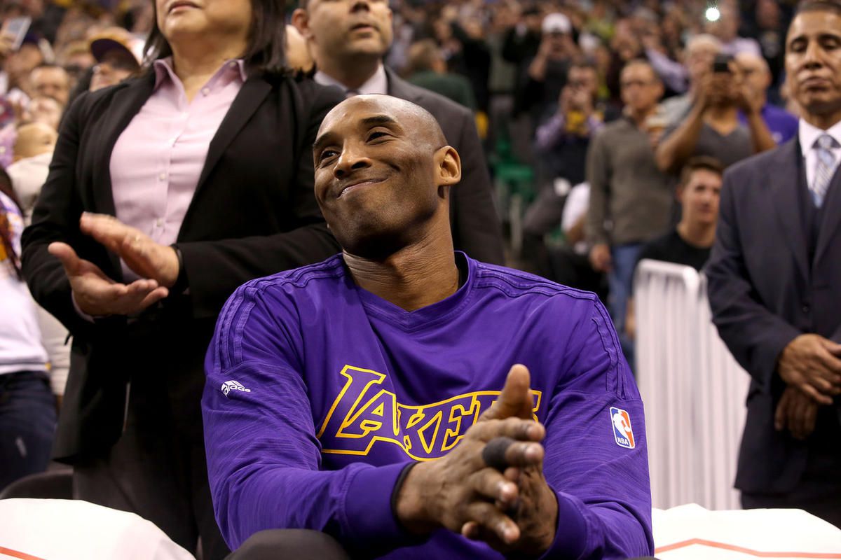 Los Angeles Lakers Kobe Bryant watches a video honoring his basketball career before the Utah Jazz game at the Vivint Smart Home Arena in Salt Lake City on Monday, March 28,  2016.  