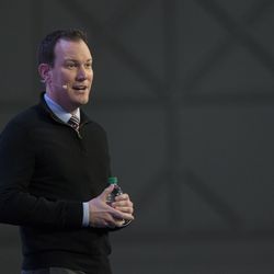 Shawn Achor, happiness expert and a New York Times best-selling author, speaks to the crowd during Qualtrics' X4 Summit at the Salt Palace Convention Center in Salt Lake City on Wednesday, March 7, 2018.