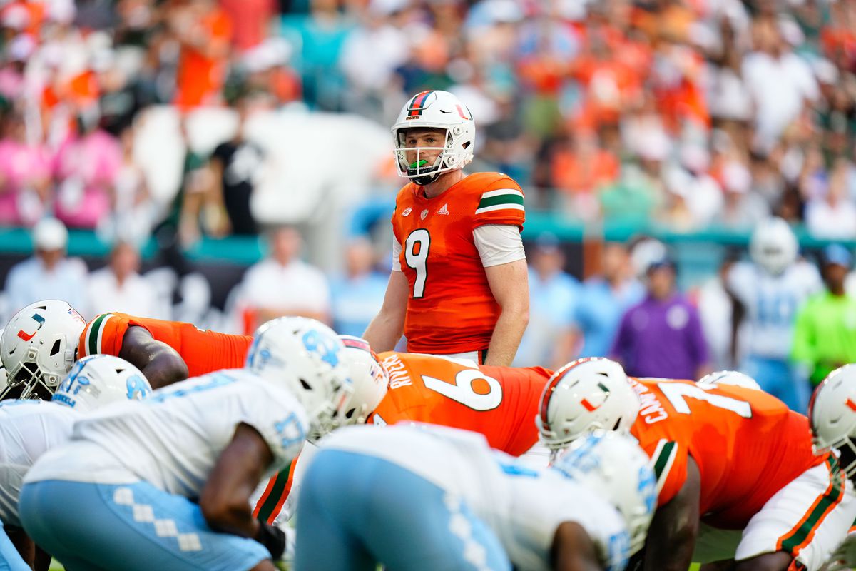 Miami Hurricanes quarterback Tyler Van Dyke gets ready for the snap against the North Carolina Tar Heels during the first half at Hard Rock Stadium.