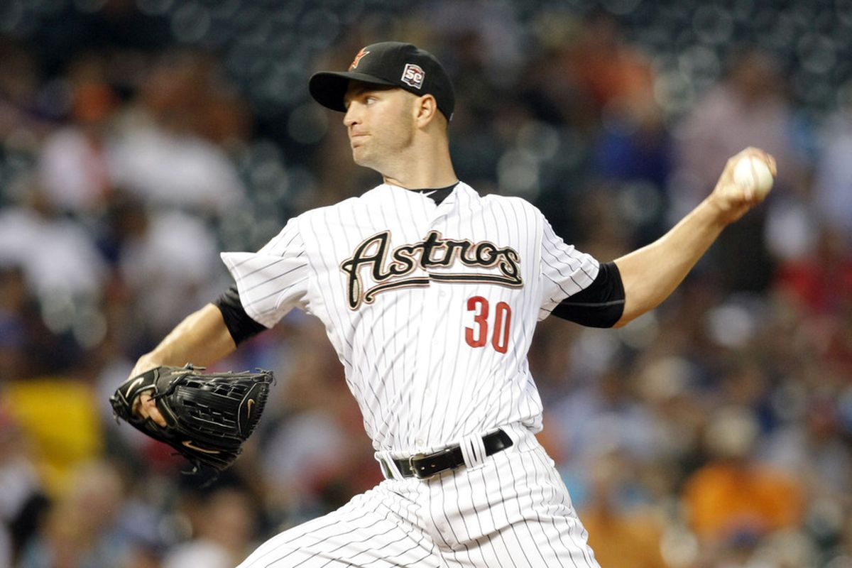 Apr 9, 2012; Houston, TX, USA; Houston Astros starting pitcher J.A. Happ (30) throws a pitch against the Atlanta Braves in the third inning at Minute Maid Park. Mandatory Credit: Brett Davis-US PRESSWIRE