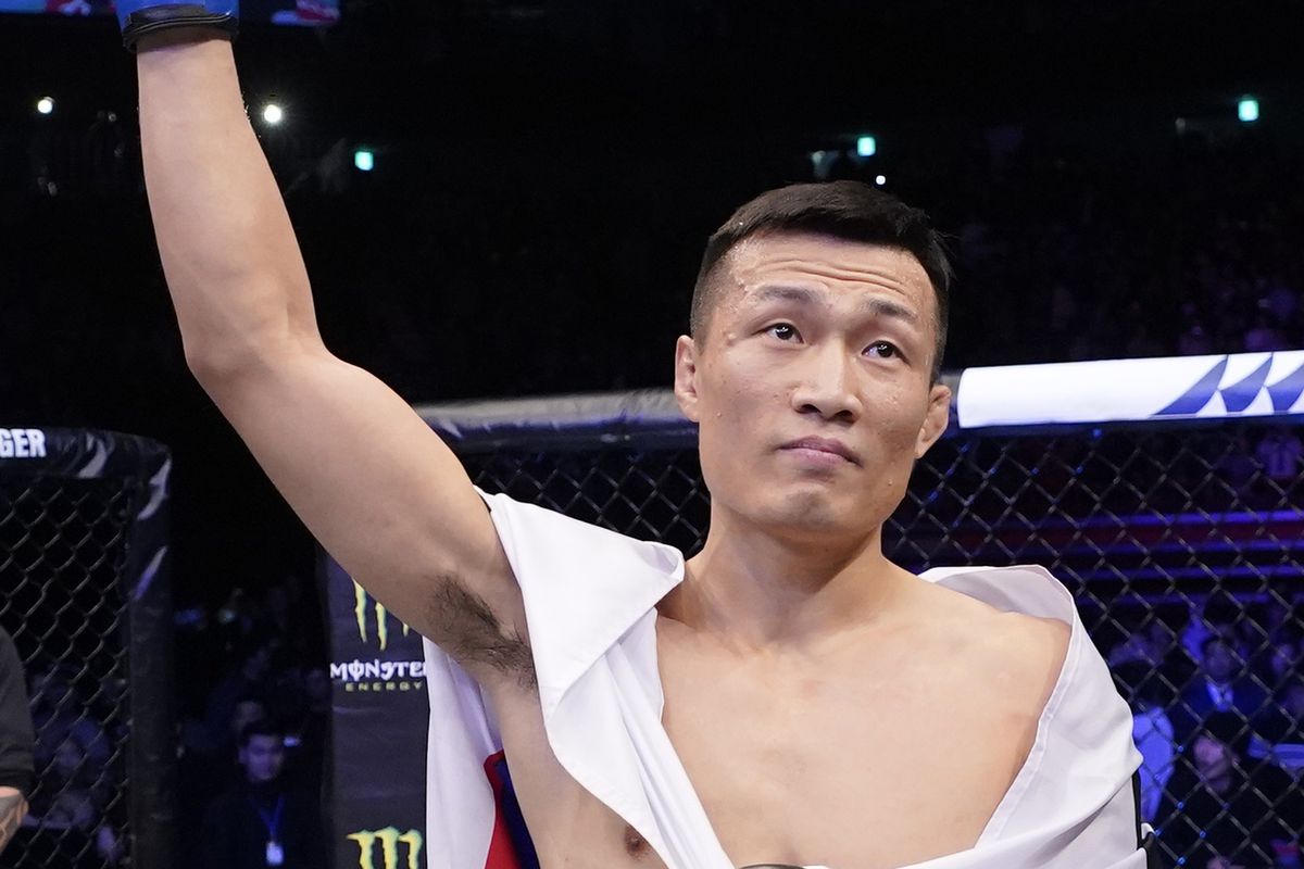 Chan Sung Jung of South Korea celebrates after knocking out Frankie Edgar in their featherweight fight during the UFC Fight Night event at Sajik Arena 3 on December 21, 2019 in Busan, South Korea.