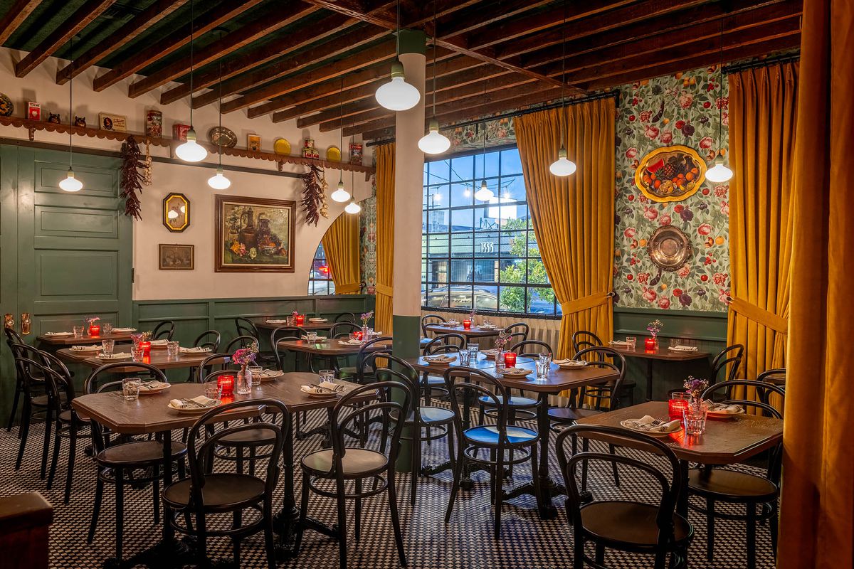 A daytime glimpse at a colorful dining room with tables at Donna’s restaurant in Echo Park, California.
