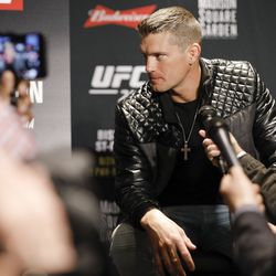 Stephen Thompson listens to a question at UFC 217 media day.